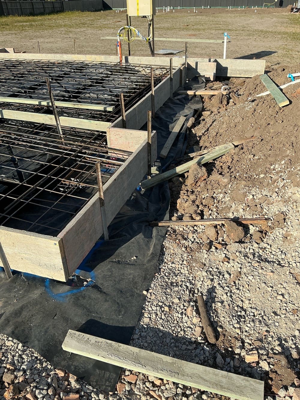Grading is required, recorded during a slab pre-pour inspection in Morayfield